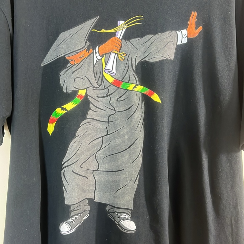 Male Graduate in Cap & Gown with Kente Cloth Stole in Dap Position